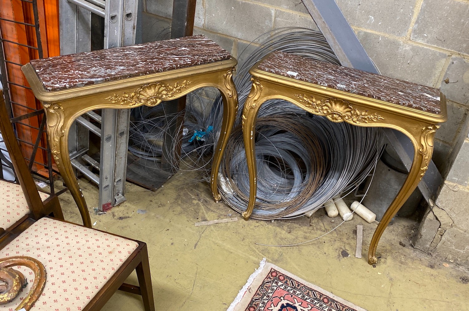 A pair of late 19th century French carved giltwood marble top console tables, width 80cm, depth 29cm, height 87cm